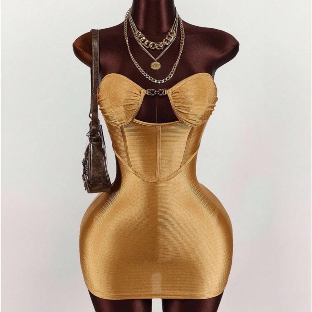 Elegant Gold Strapless Dress . I have a medium and a large ! Both for 20